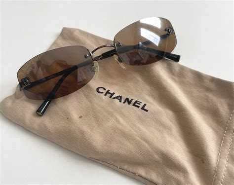 chanel rimless sunglasses on face